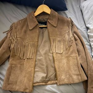 Wilson’s leather brand suede fringe jacket. Has only been worn twice.